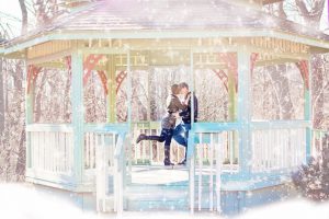 Couple kissing in a Wooden Gazebo